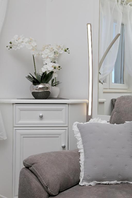 Postel nebo postele na pokoji v ubytování MIRROR apartment