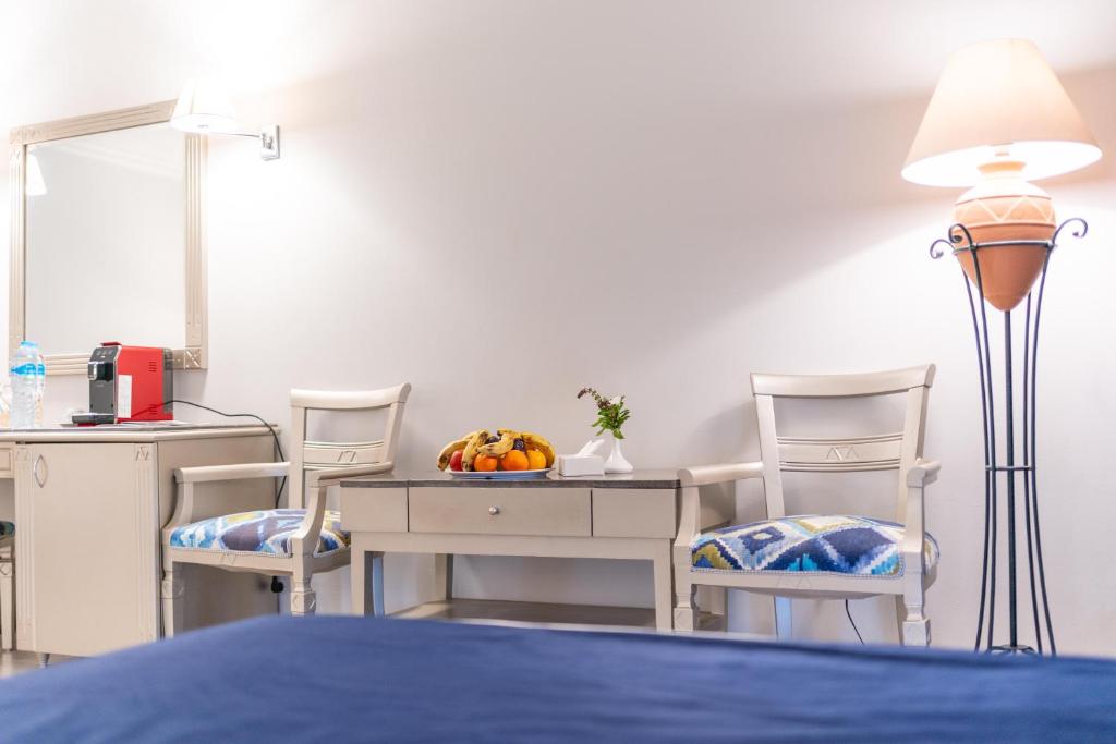Postel nebo postele na pokoji v ubytování Malikia Resort Abu Dabbab