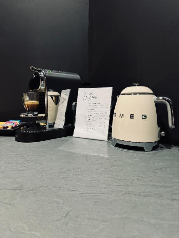 a tea kettle sitting on top of a table at Les secrets d&#39;Eros - DAX in Dax