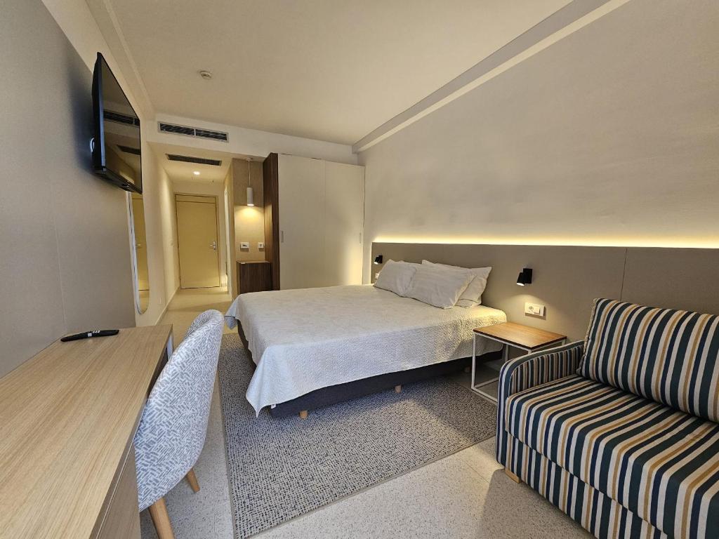 Postel nebo postele na pokoji v ubytování Family Hotel Adria - All inclusive