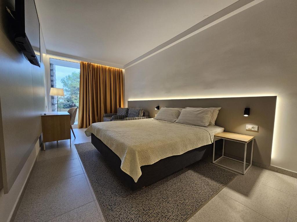 Postel nebo postele na pokoji v ubytování Family Hotel Adria - All inclusive