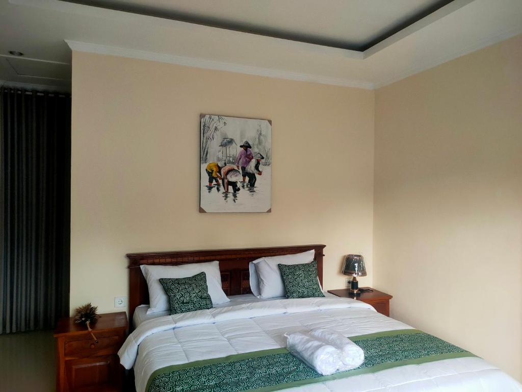 Postel nebo postele na pokoji v ubytování Karmila House