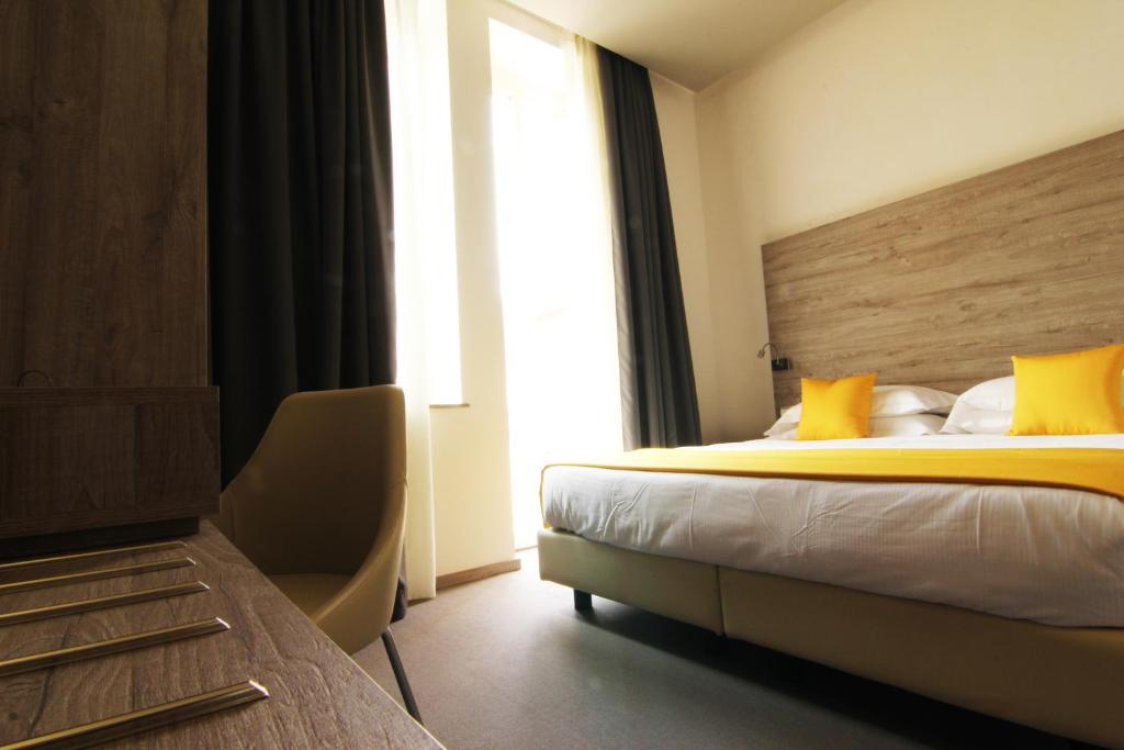 Postel nebo postele na pokoji v ubytování Sole Hotel Verona