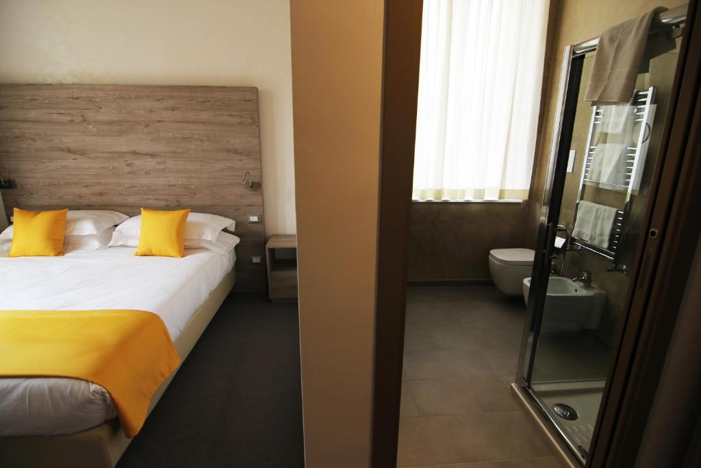 Postel nebo postele na pokoji v ubytování Sole Hotel Verona