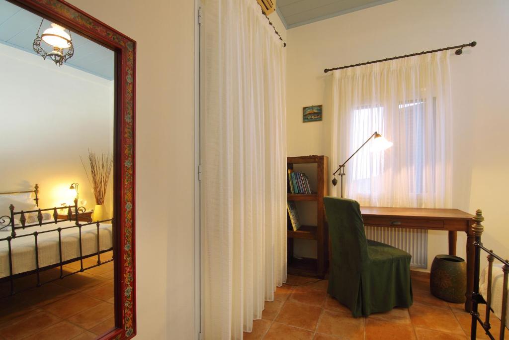 Postel nebo postele na pokoji v ubytování Villa Spilies Kythira
