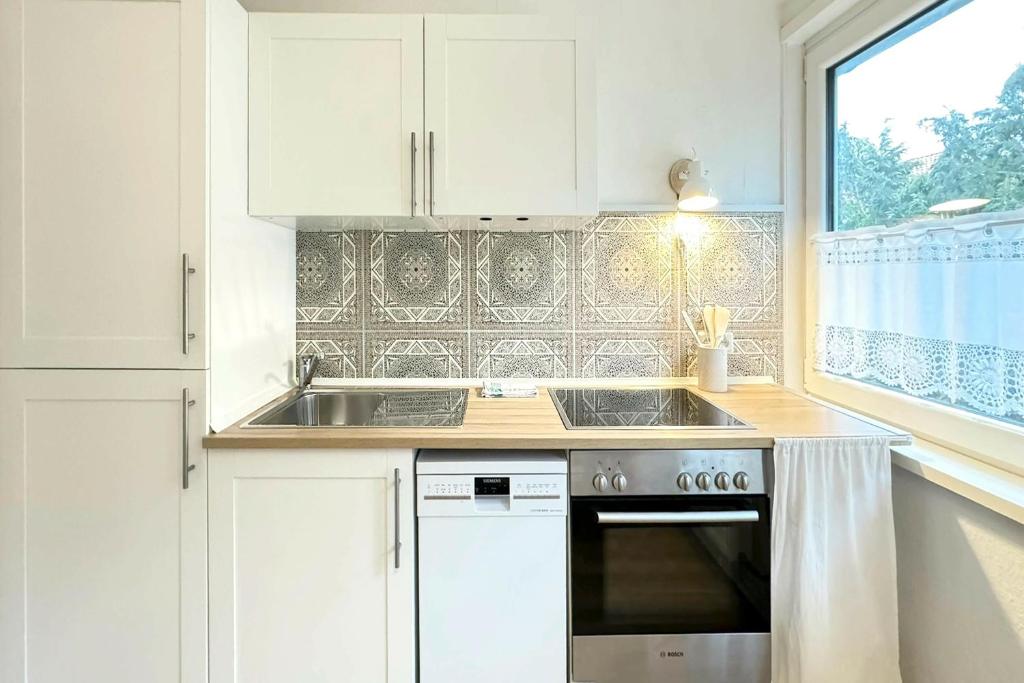 Kuchyň nebo kuchyňský kout v ubytování Ferienwohnung am Hafen Bad Bevensen