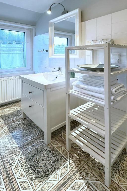 Postel nebo postele na pokoji v ubytování Ferienwohnung am Hafen Bad Bevensen