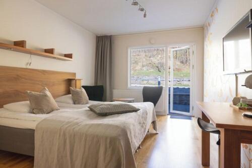 Postel nebo postele na pokoji v ubytování Albert Kök Hotell & Konferens