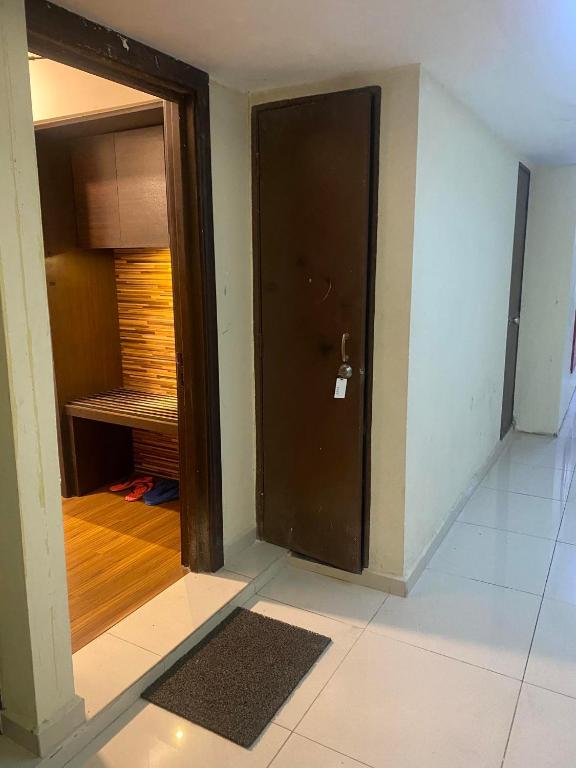 Postel nebo postele na pokoji v ubytování Ain Studio Apartment