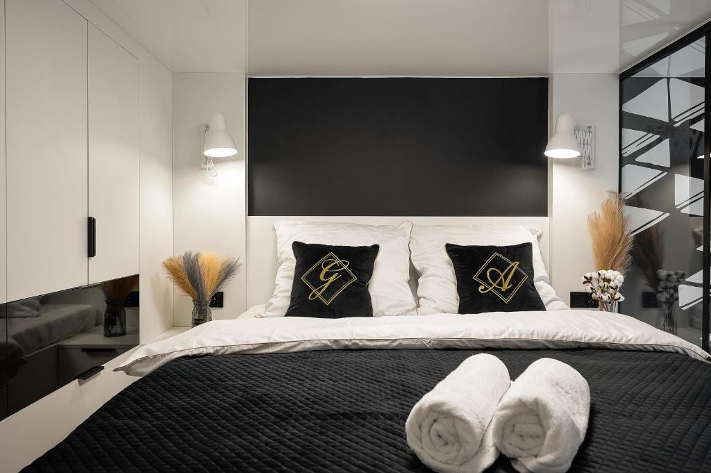 Posteľ alebo postele v izbe v ubytovaní Loft Piotrkowska 37