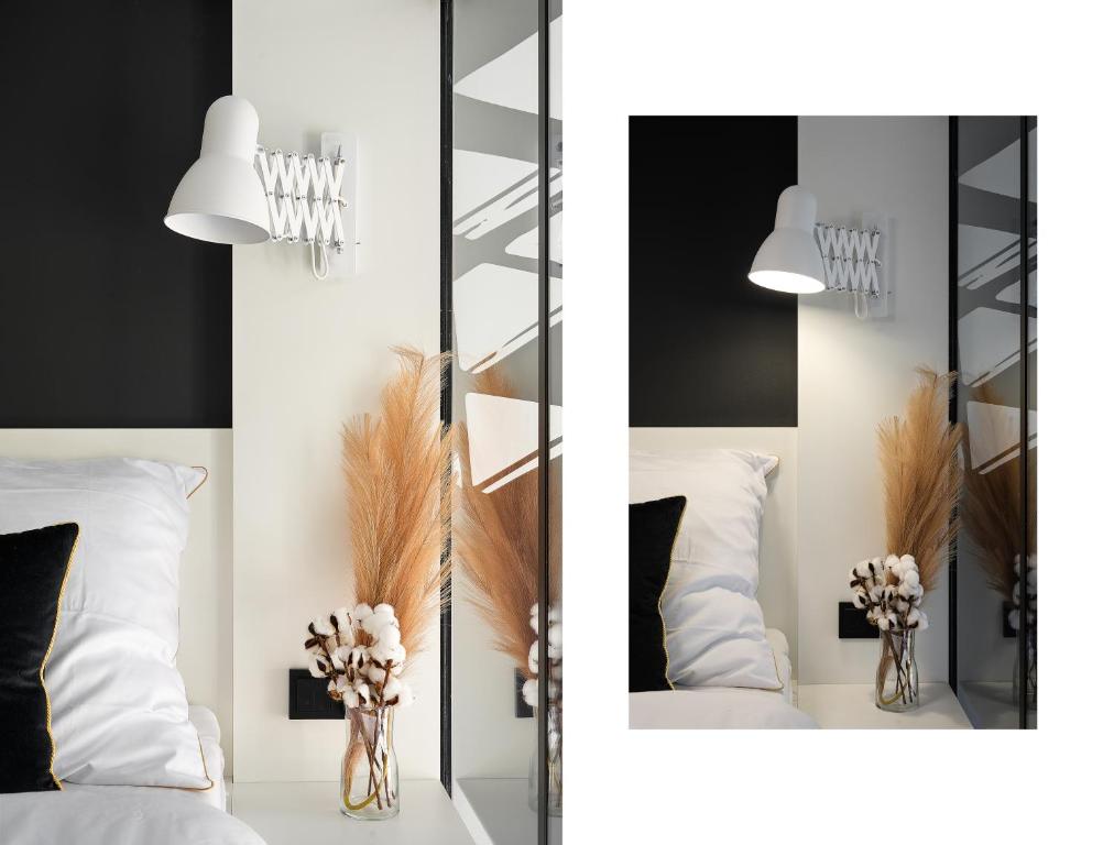 Posteľ alebo postele v izbe v ubytovaní Loft Piotrkowska 37