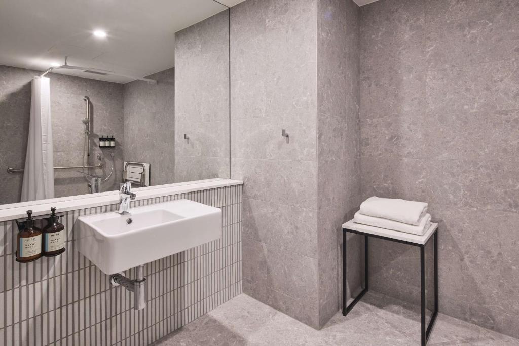 Koupelna v ubytování Hotel Alba Adelaide