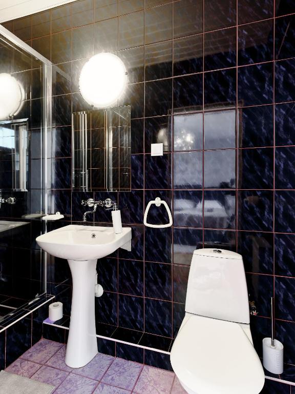 Kúpeľňa v ubytovaní Villa Łeba II - Loft Apartments