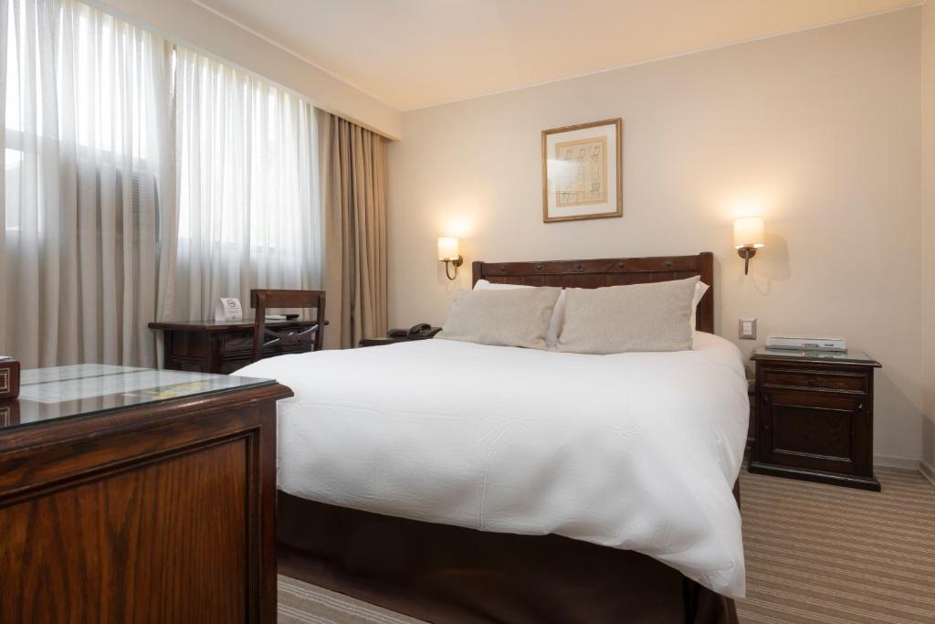 Postel nebo postele na pokoji v ubytování Teclados Hotel