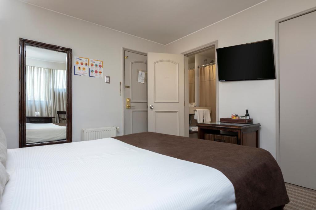Postel nebo postele na pokoji v ubytování Teclados Hotel