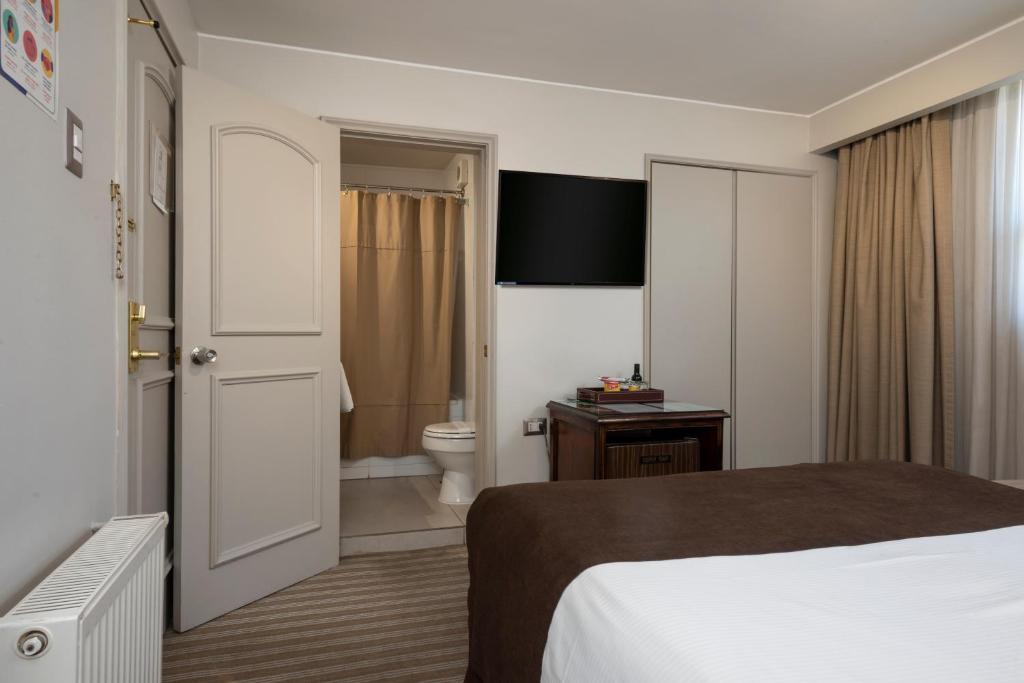 Postel nebo postele na pokoji v ubytování Teclados Hotel