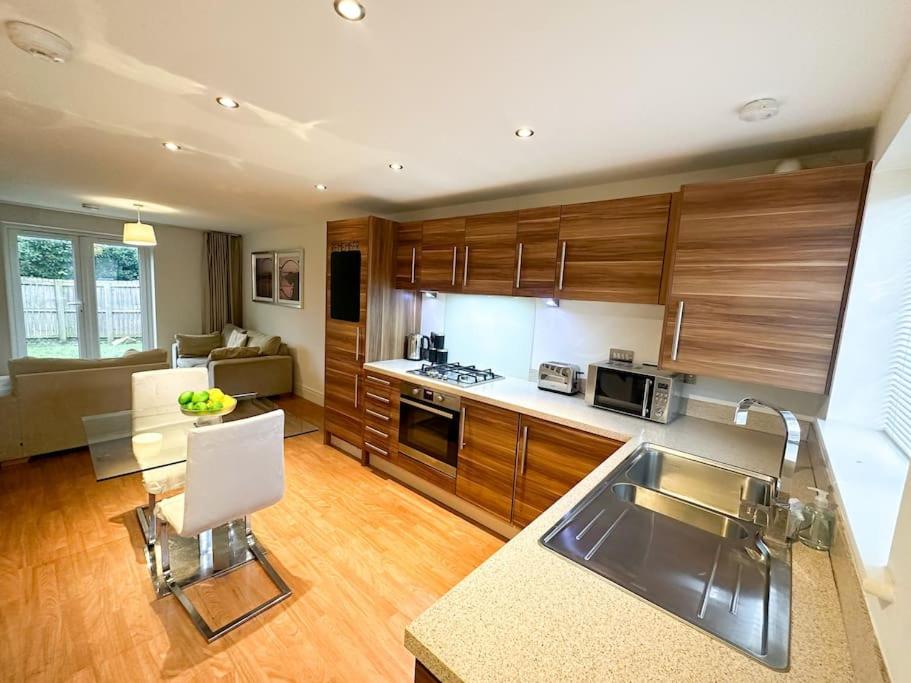 a kitchen with a sink and a counter top at No.2 by Blue Skies Stays in Thornaby on Tees