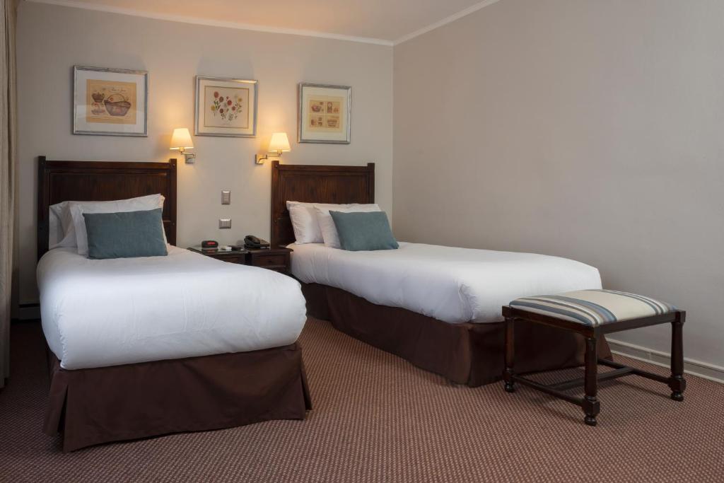Postel nebo postele na pokoji v ubytování Teclados Hotel