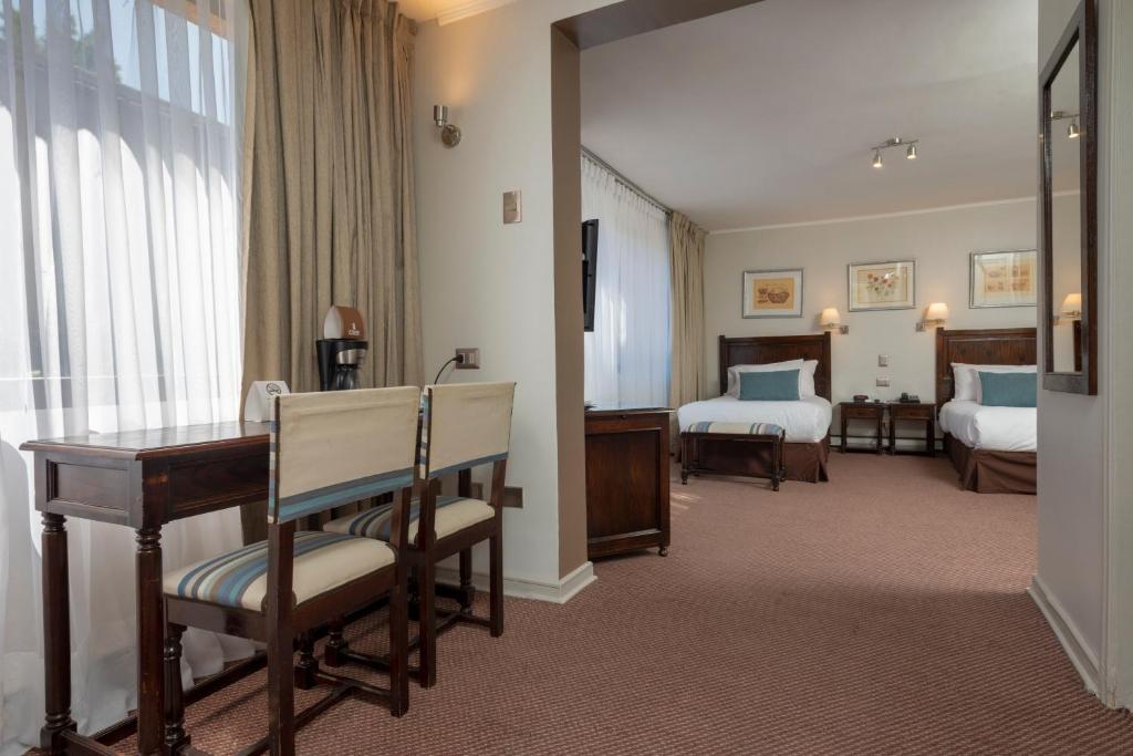 Postel nebo postele na pokoji v ubytování Teclados Hotel