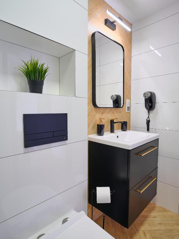 Kúpeľňa v ubytovaní Villa Łeba II - Loft Apartments