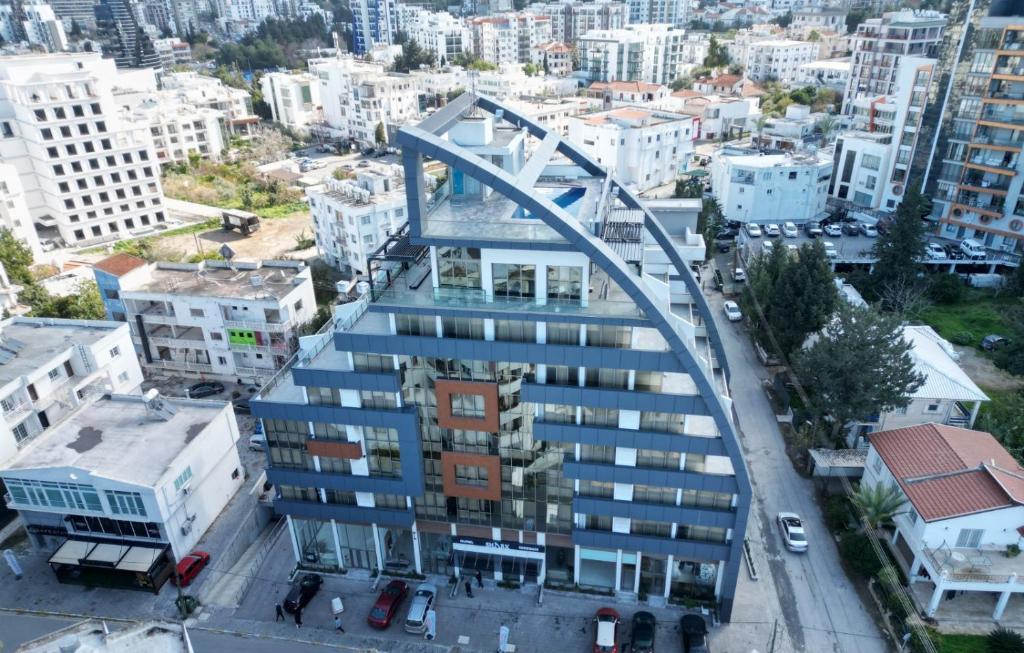 a building with a bridge over a city at Nurel Shark Residence in Kyrenia