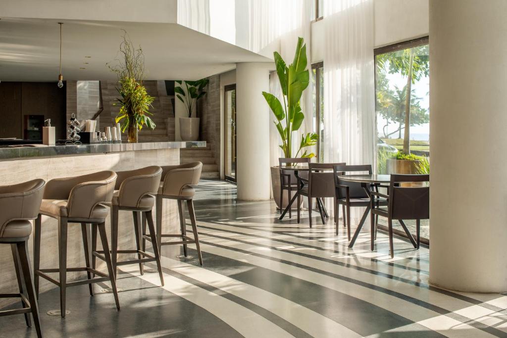 Um restaurante ou outro lugar para comer em Lifestyle Laghetto Collection