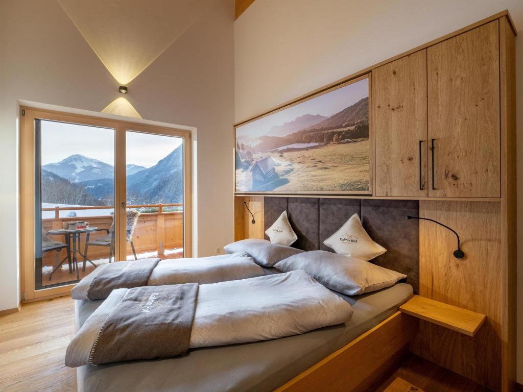Postel nebo postele na pokoji v ubytování Appartements Kafmahof