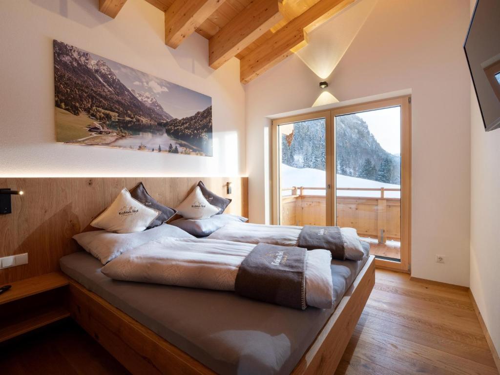 Postel nebo postele na pokoji v ubytování Appartements Kafmahof