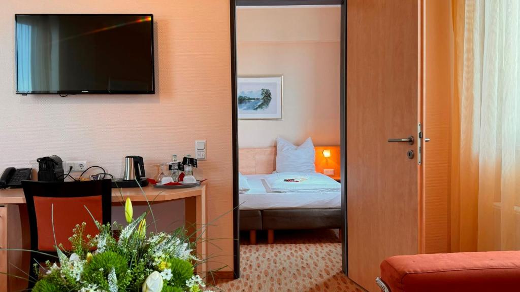 Hotel Rhein-Ruhr Bottropにあるベッド