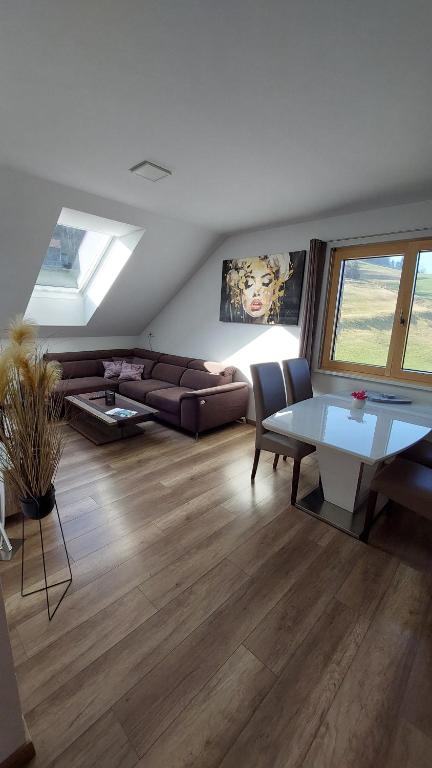 Posezení v ubytování Living Apartment