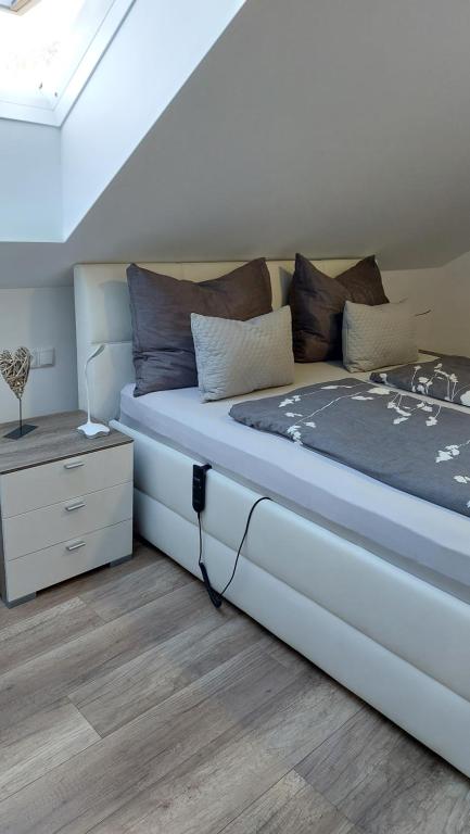 Postel nebo postele na pokoji v ubytování Living Apartment