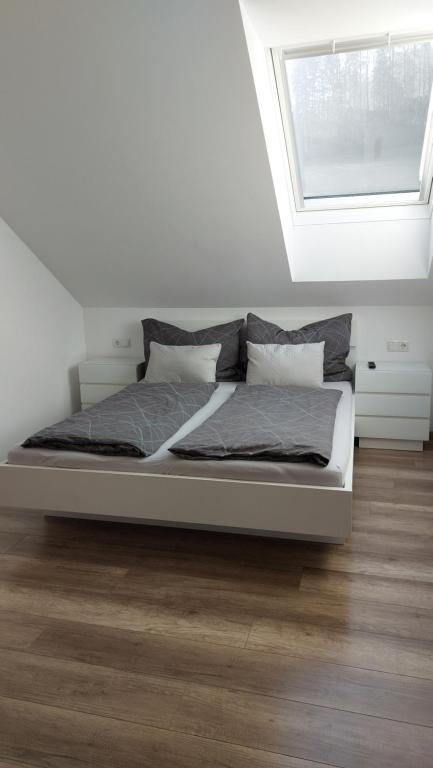 Postel nebo postele na pokoji v ubytování Living Apartment