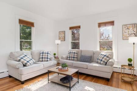 a living room with two couches and a table at New Near Beach Casino Dunes Zoo& Restaurants in Michigan City