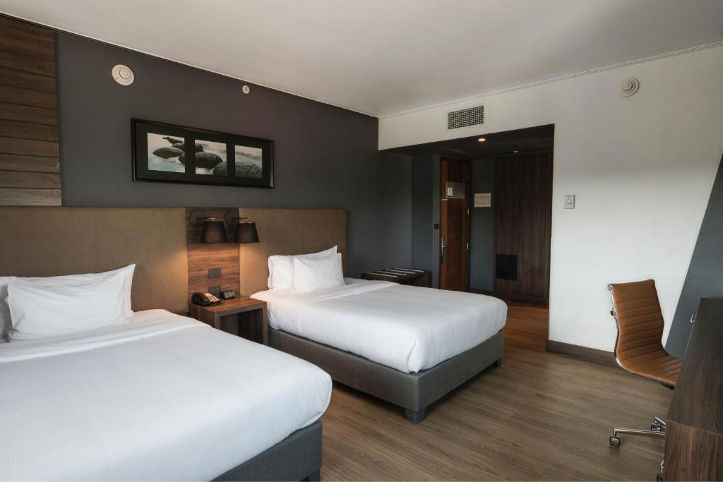 Postel nebo postele na pokoji v ubytování Courtyard by Marriott Puerto Montt