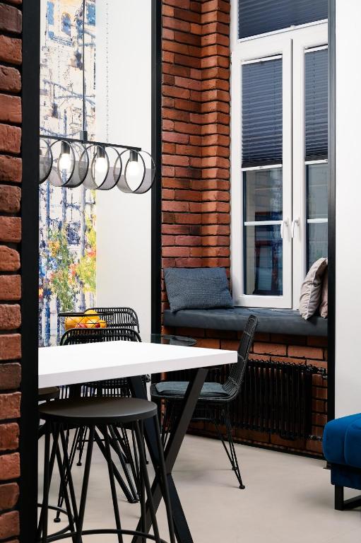Posedenie v ubytovaní Loft Piotrkowska 37
