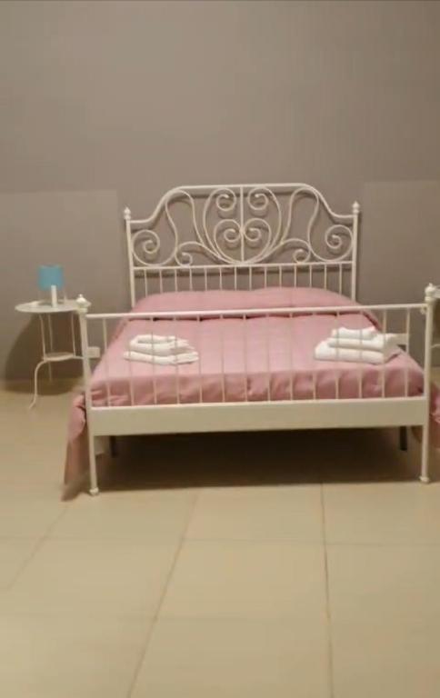 Postel nebo postele na pokoji v ubytování PERSEFONE LUXURY SUITE