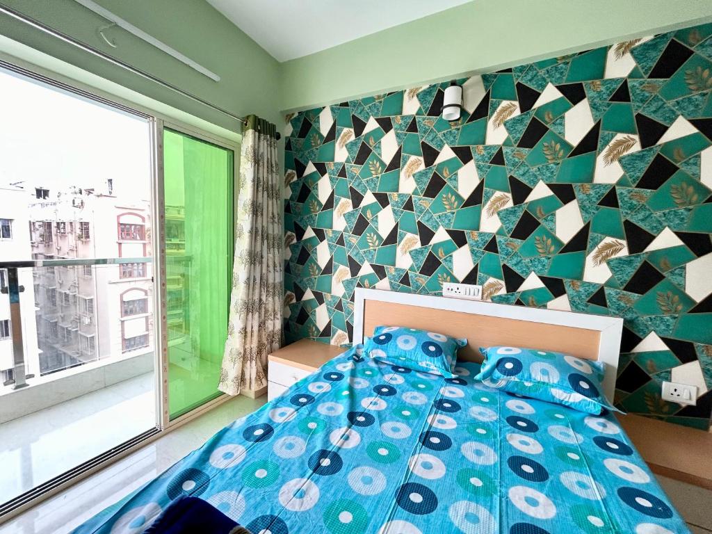 Voodi või voodid majutusasutuse Exquisite 3BHK Apartment in the heart of Newtown beside Axis Mall, Action Area 1 toas