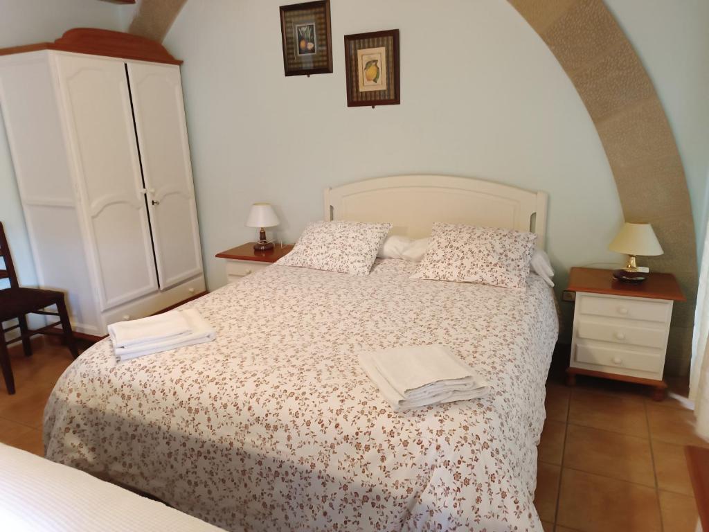 Cama o camas de una habitación en Apartamentos Plaza Mayor