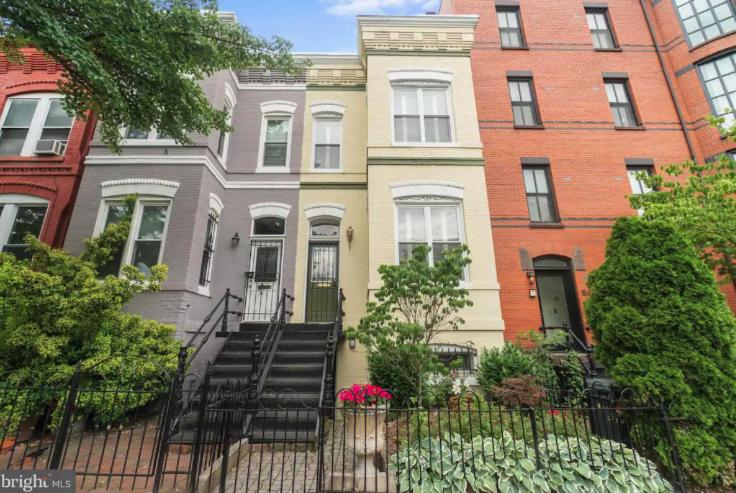 a group of houses with stairs in front of them at Logan Circle Living in Washington