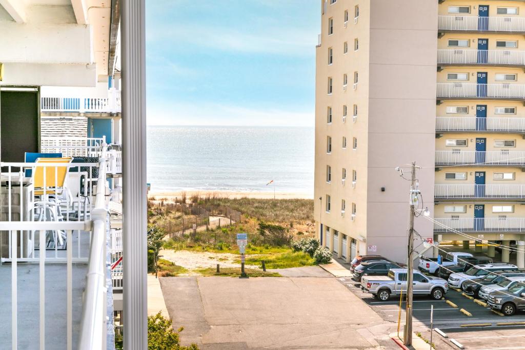 a view of the ocean from the balcony of a building at Ocean City Beach Retreat with Linens Included in Ocean City
