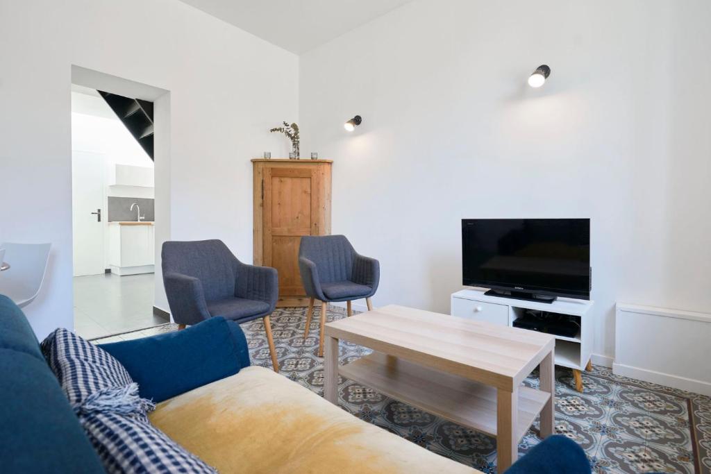 Et opholdsområde på House with terrace 2 bedrooms in Marcq en Baroeul