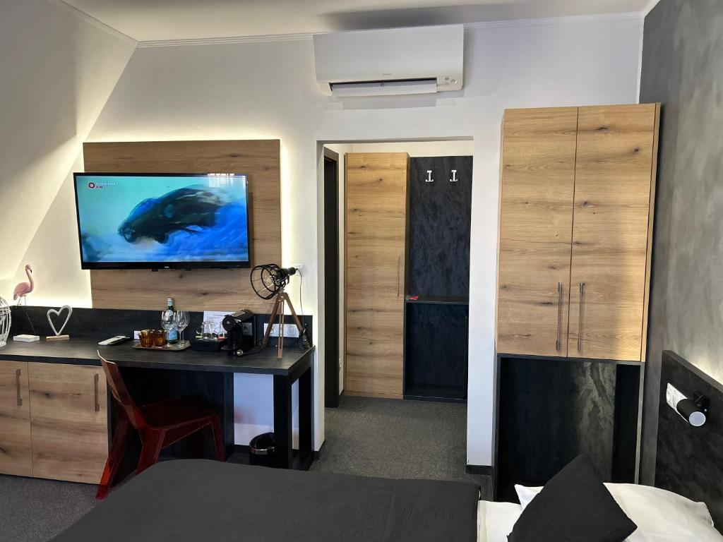 TV a/nebo společenská místnost v ubytování Hotel 14Dveří