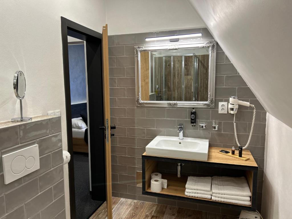 Koupelna v ubytování Hotel 14Dveří