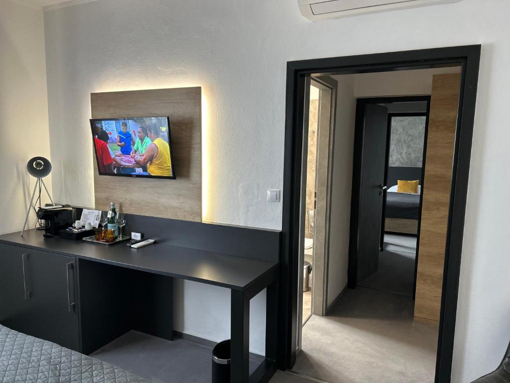 TV a/nebo společenská místnost v ubytování Hotel 14Dveří