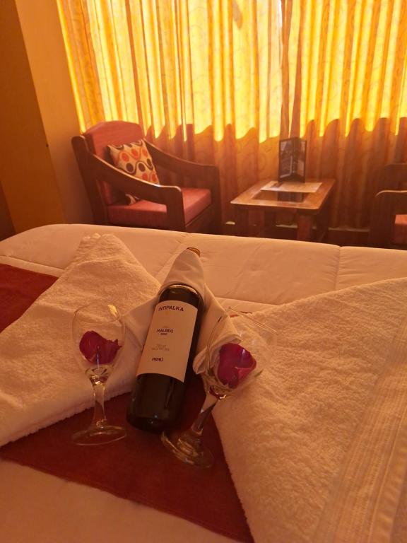 Postel nebo postele na pokoji v ubytování Chaska valle Inn
