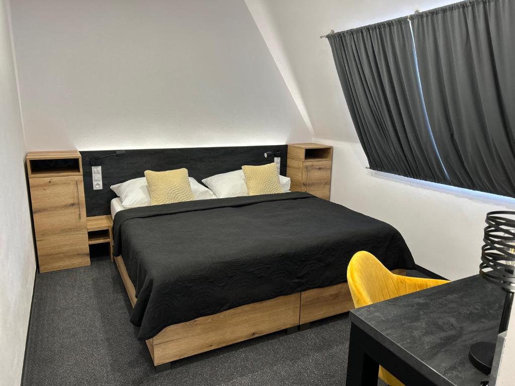 Postel nebo postele na pokoji v ubytování Hotel 14Dveří