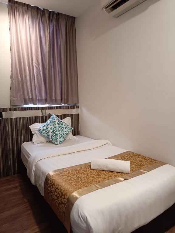 Postel nebo postele na pokoji v ubytování Kino Hotel