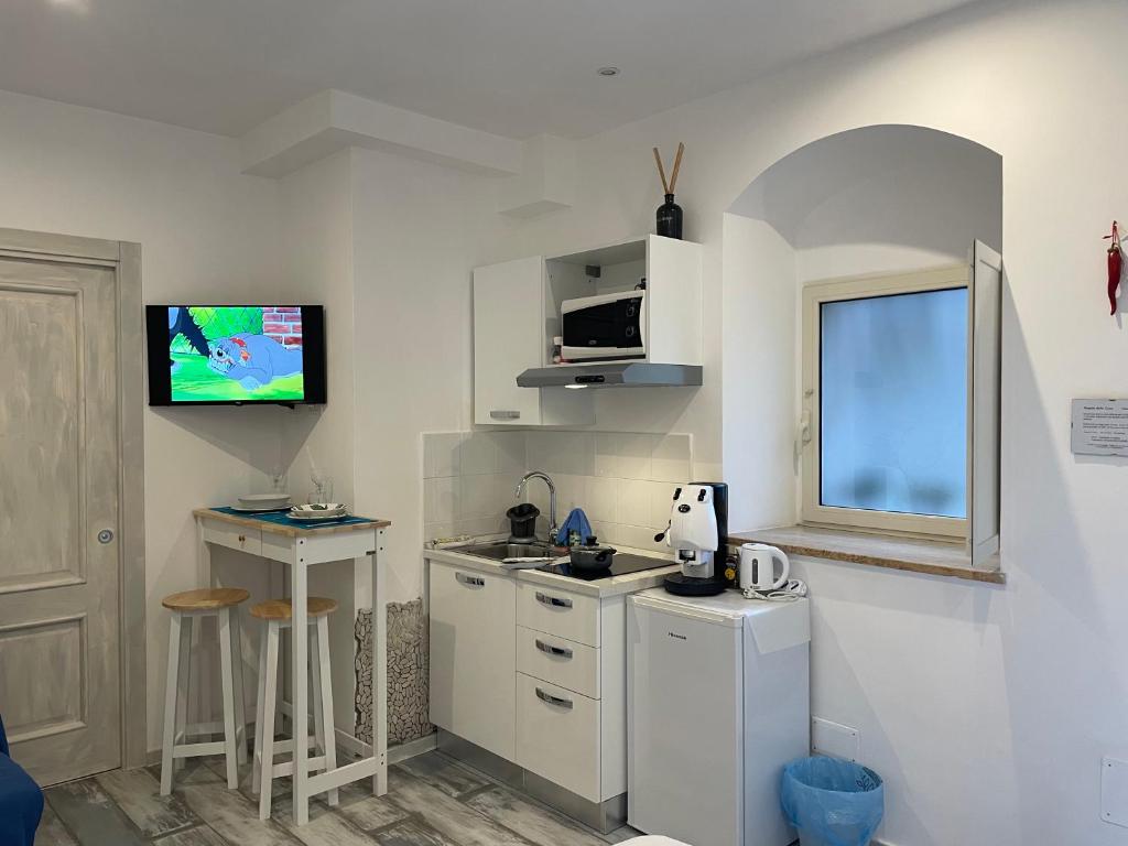 Kuchyň nebo kuchyňský kout v ubytování Il Ciottolo Sorrento