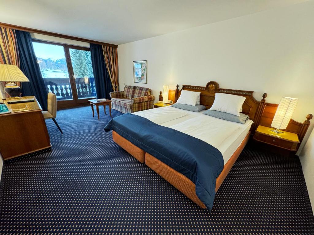Postel nebo postele na pokoji v ubytování Hotel Hocheder