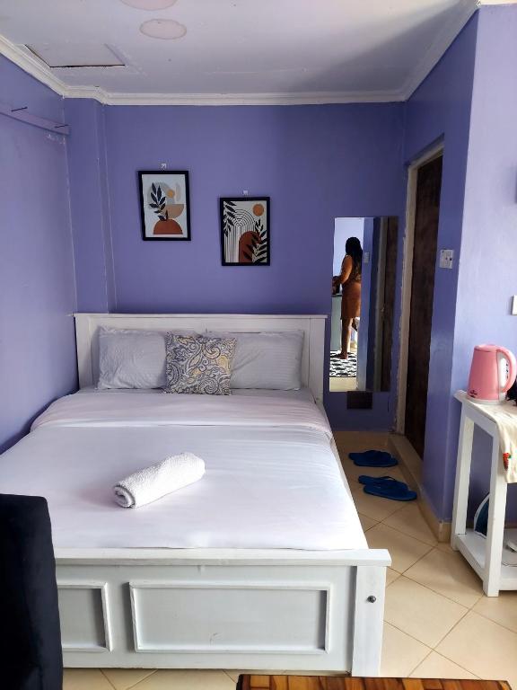 Postel nebo postele na pokoji v ubytování Jeda Homey Homes Studio Apartment